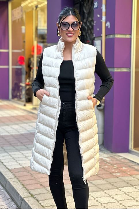 Kapşonu Kürk Detaylı Uzun Şişme Yelek-Krem